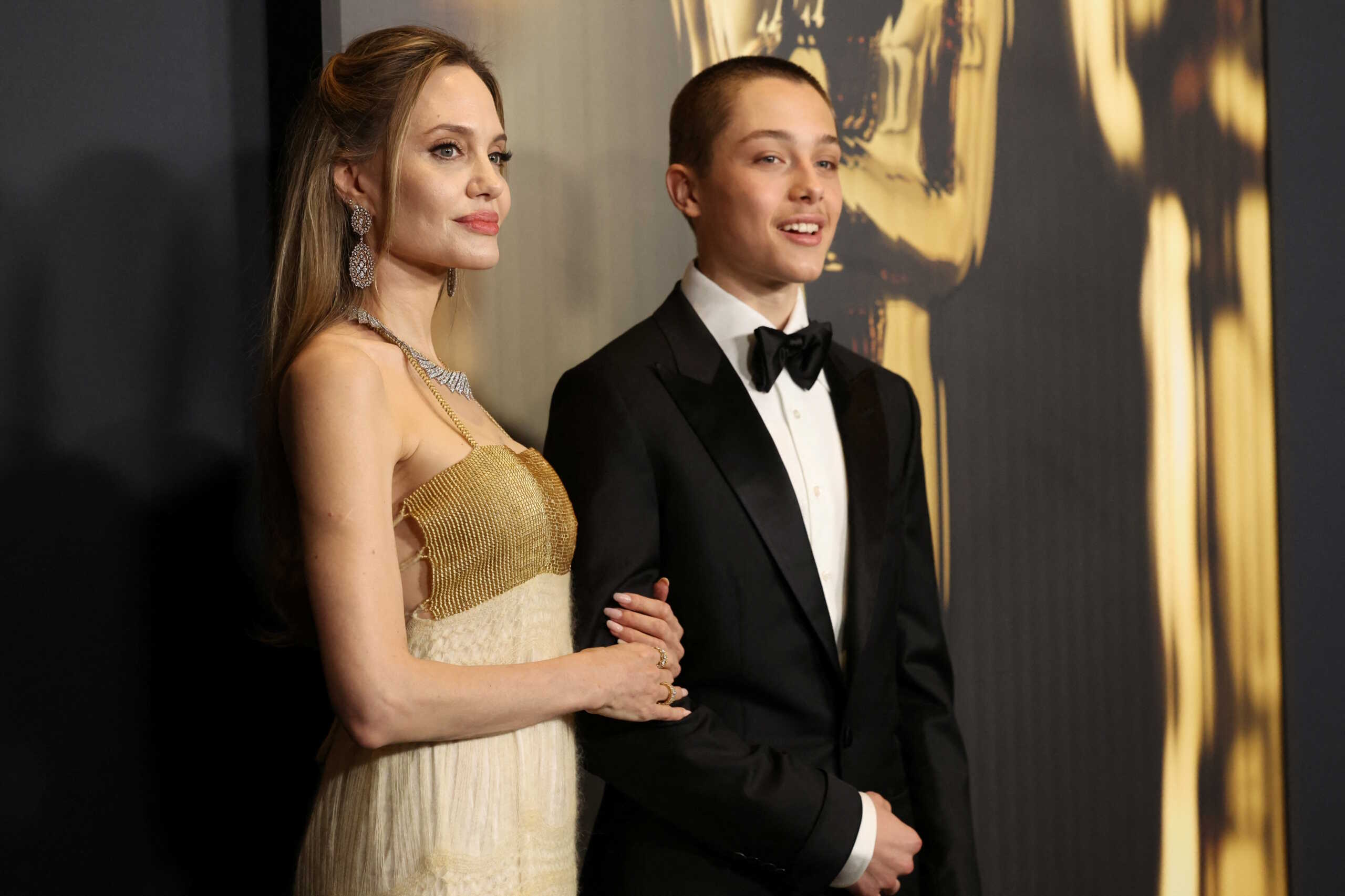 Angelina Jolie and Knox Jolie-Pitt attend the Academy of Motion Picture Arts and Sciences 15th Governors Awards at the Ray Dolby Ballroom in Los Angeles, California, U.S. November 17, 2024. REUTERS