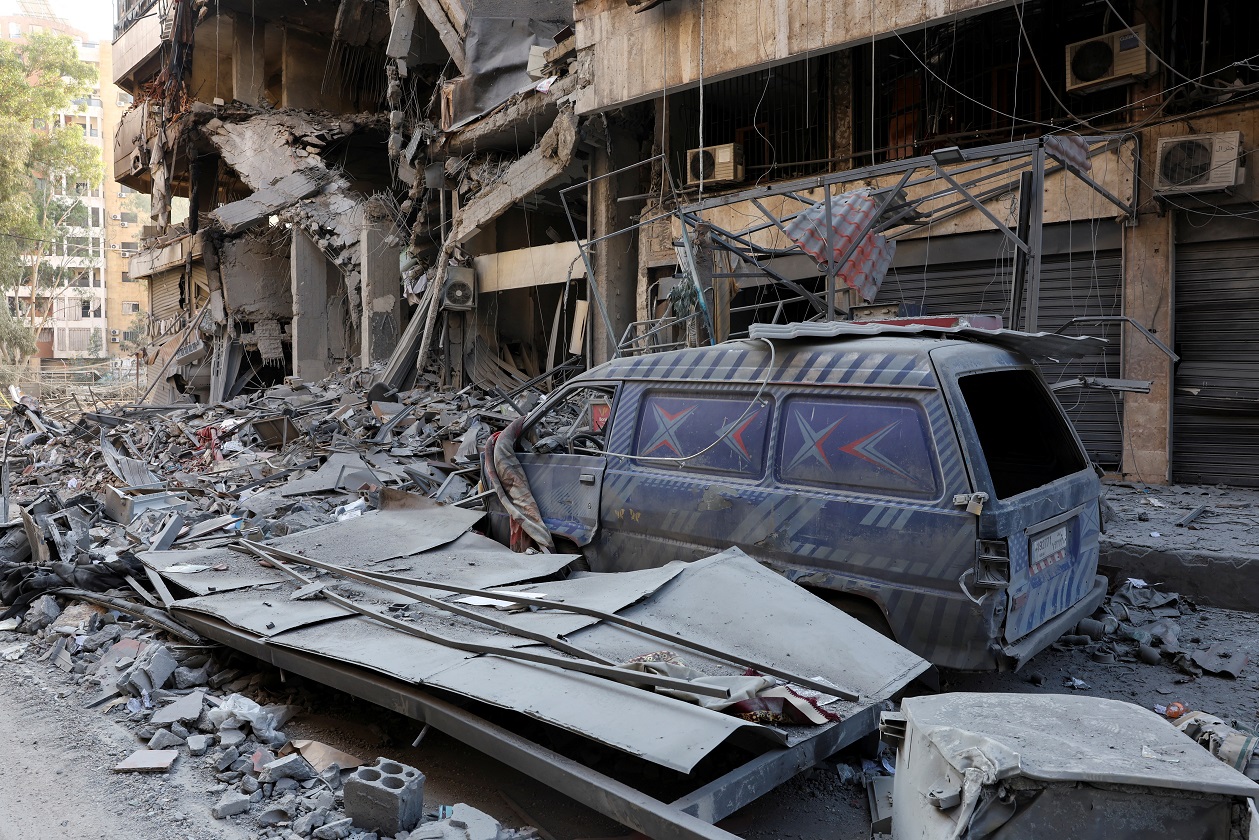 Rubble lies near a damaged car, on site of damaged buildings, in the aftermath of Israeli strikes on Beirut's southern suburbs, during a Hezbollah media tour, amid the ongoing hostilities between Hezbollah and Israeli forces, Lebanon, November 9, 2024. REUTERS