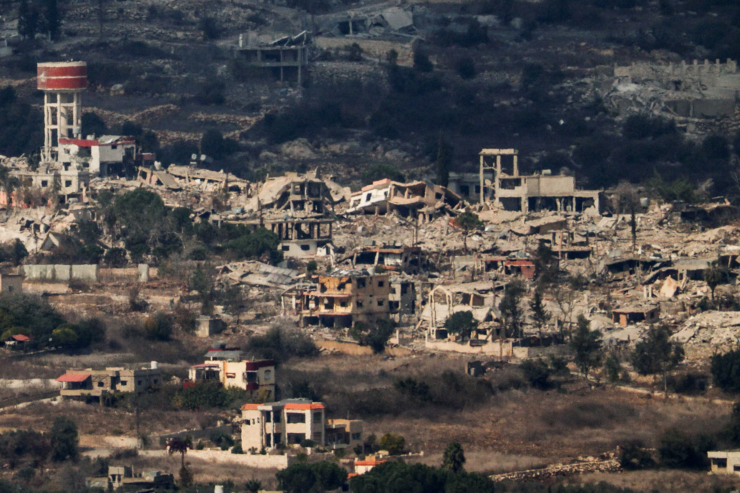 A view shows destroyed buildings on the Lebanon's side of the border with Israel, amid ongoing hostilities between Hezbollah and Israeli forces, as seen from Mount Addir, northern Israel, October 31, 2024. REUTERS