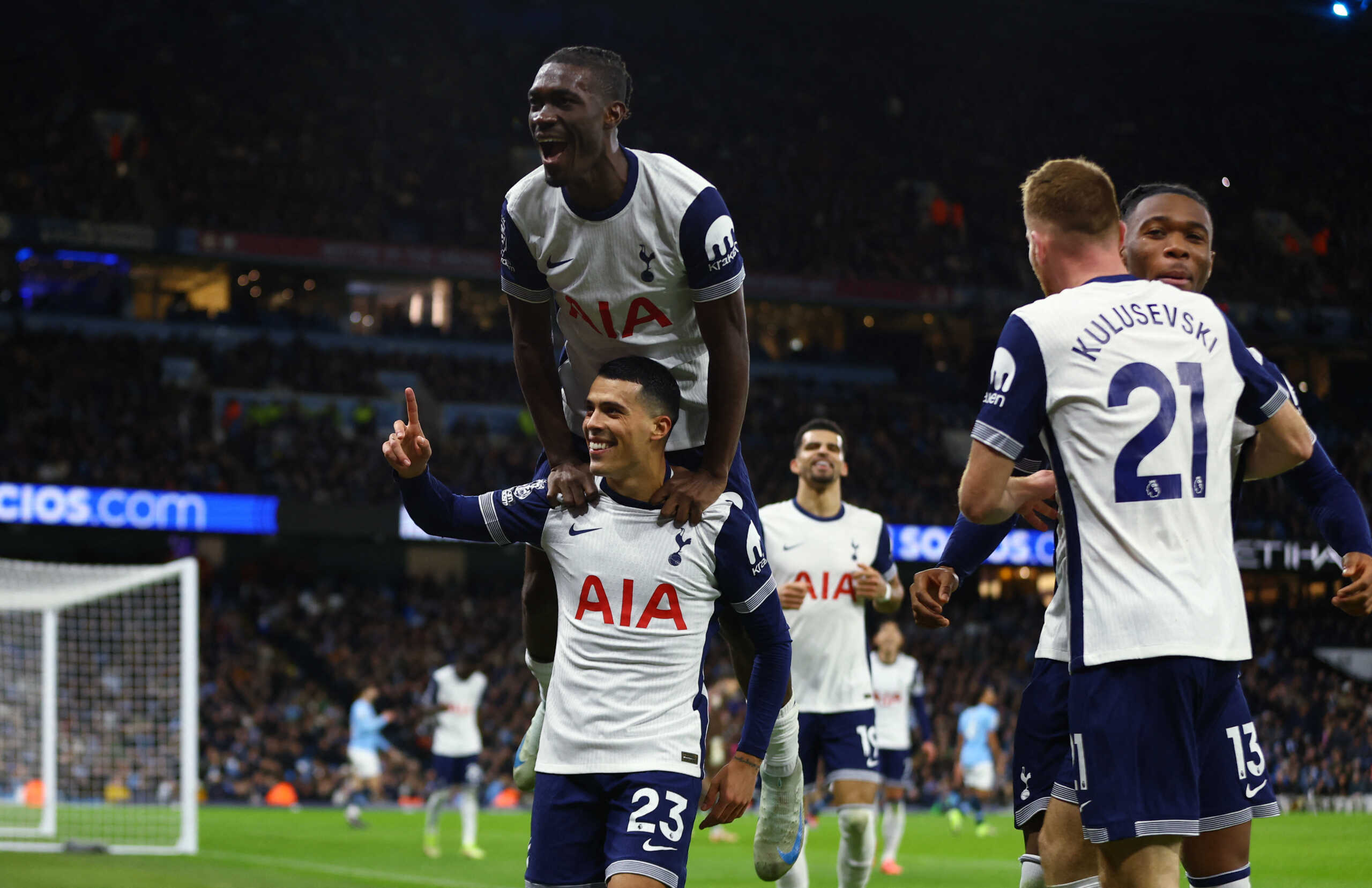 Soccer Football - Premier League - Manchester City v Tottenham Hotspur - Etihad Stadium, Manchester, Britain - November 23, 2024 Tottenham Hotspur's Pedro Porro celebrates scoring their third goal with Yves Bissouma REUTERS