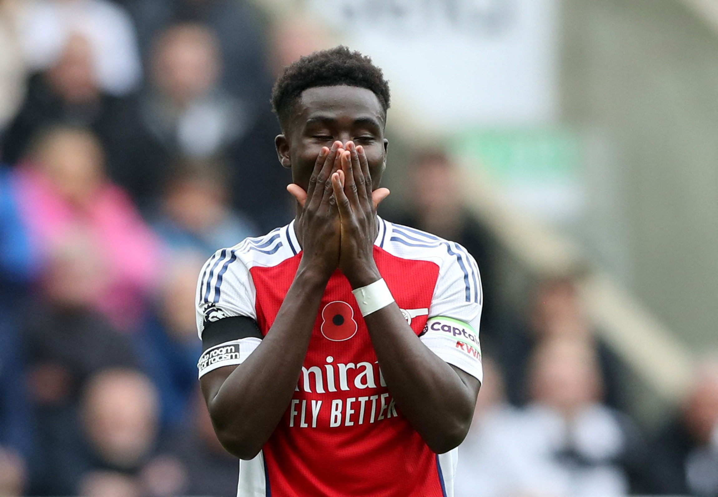 Soccer Football - Premier League - Newcastle United v Arsenal - St James' Park, Newcastle, Britain - November 2, 2024 Arsenal's Bukayo Saka reacts REUTERS