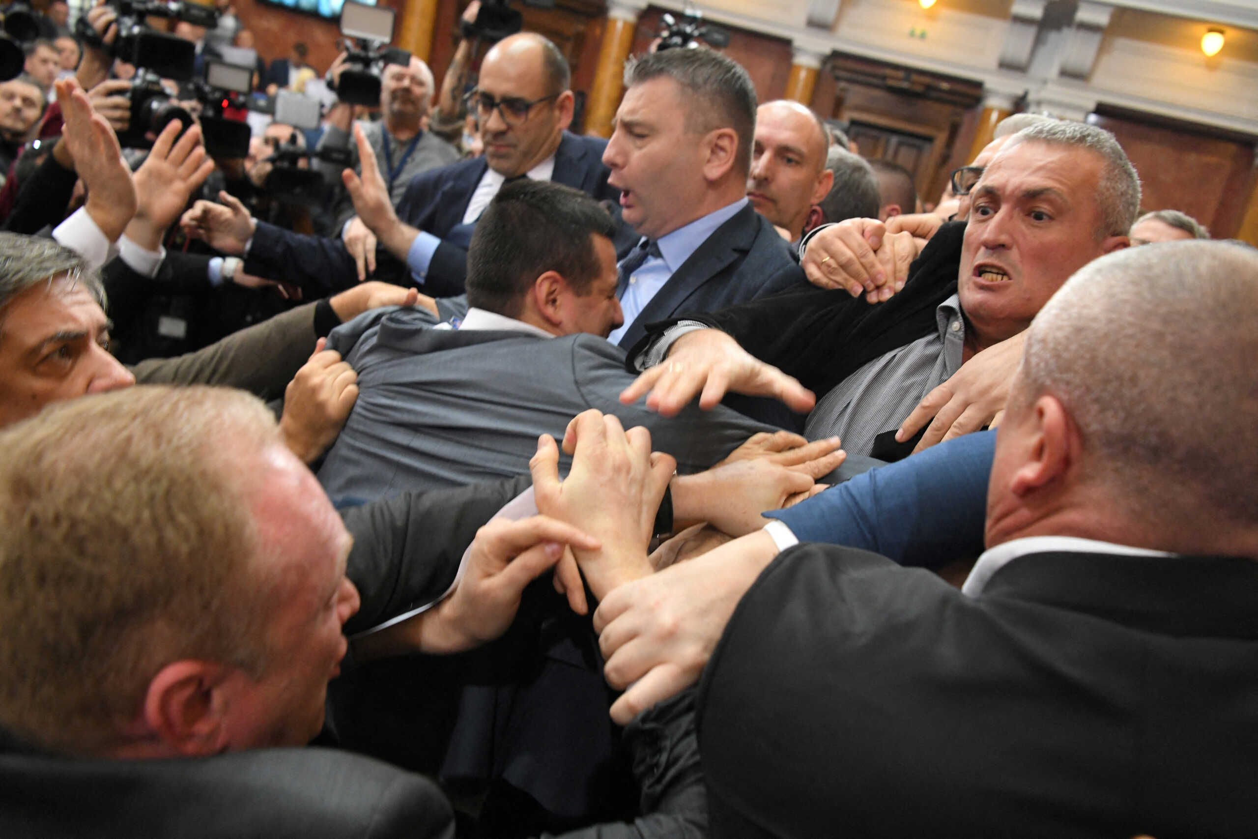 Opposition and the ruling coalition deputies brawl as tensions rose over Novi Sad's fatal train station roof collapse, during a session in the Serbian parliament hall in Belgrade, Serbia, November 25, 2024. REUTERS