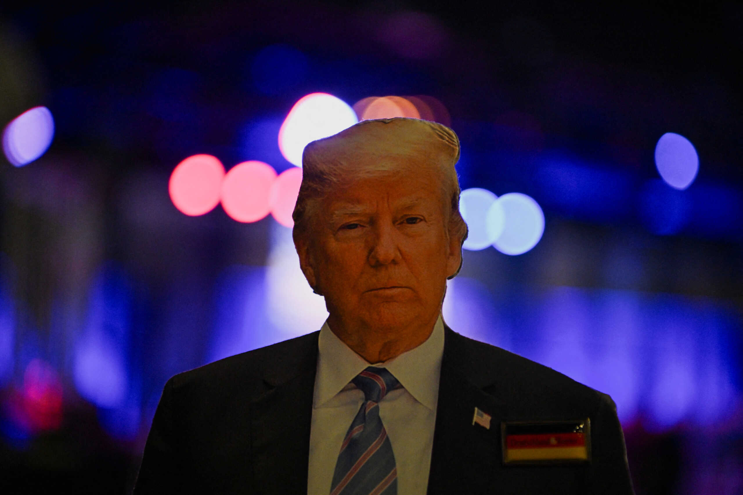 A cardboard cutout of Republican presidential nominee and former U.S. President Donald Trump sits at the venue of his watch party in Palm Beach County Convention Center, in West Palm Beach, Florida, U.S., November 5, 2024. REUTERS