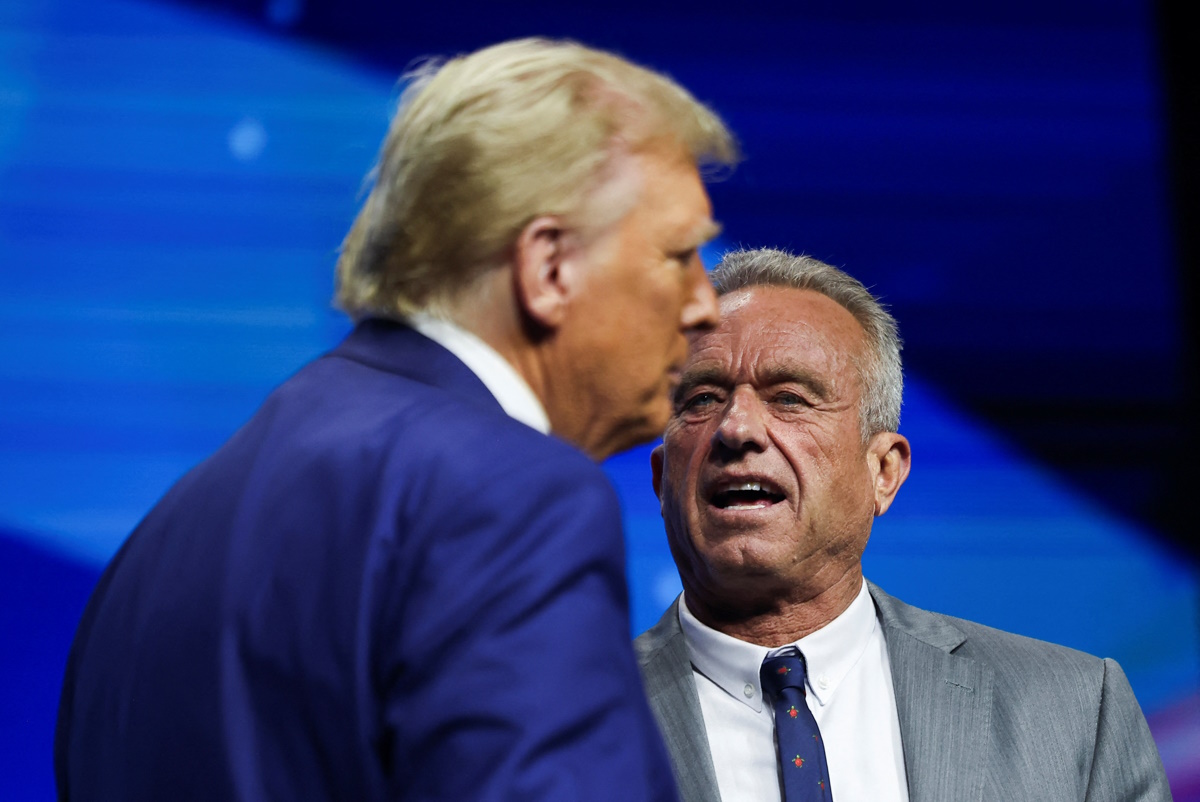 Robert F. Kennedy Jr. and Republican presidential nominee and former U.S. President Donald Trump attend a campaign event sponsored by conservative group Turning Point USA, in Duluth, Georgia, U.S., October 23, 2024. REUTERS