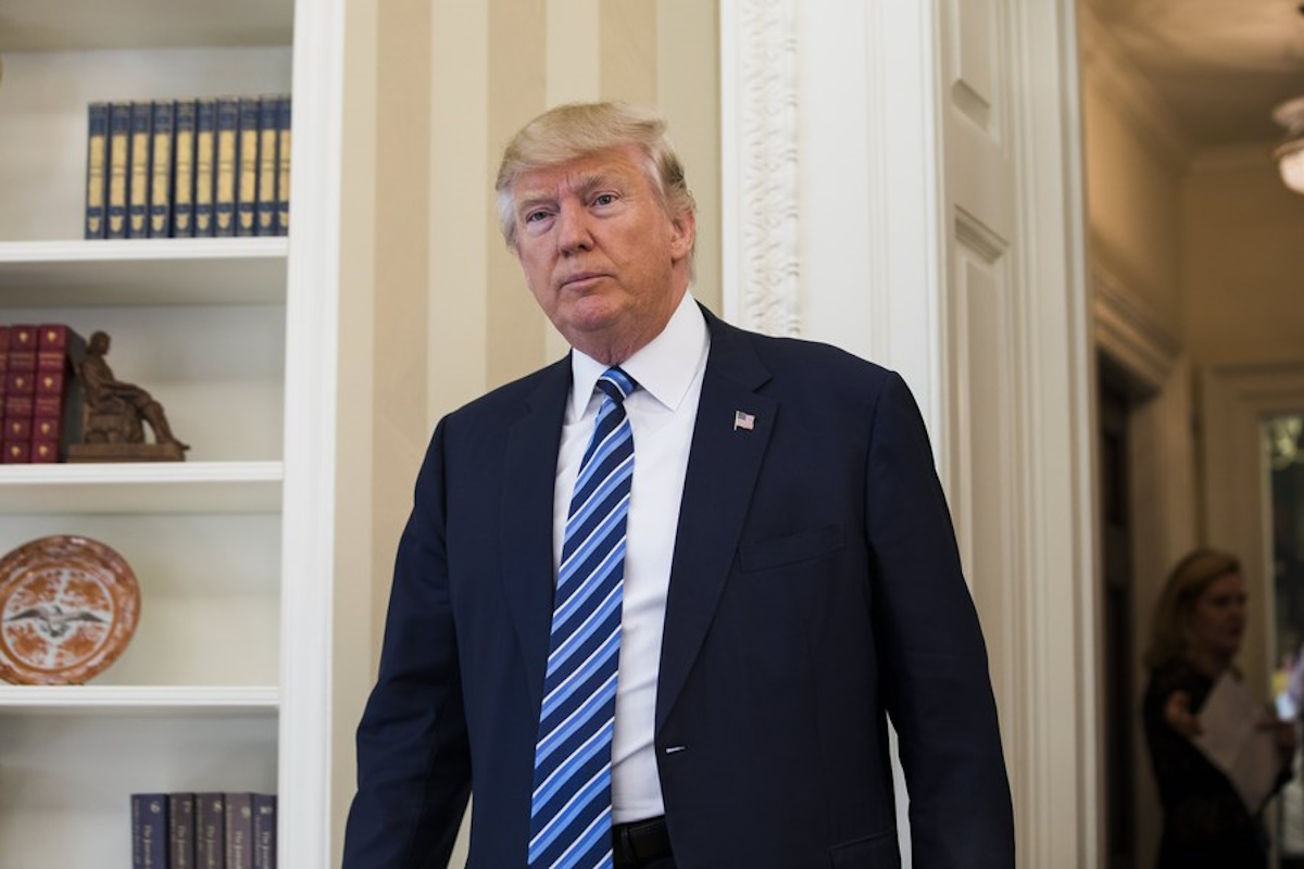 epa05780868 US President Donald J. Trump enters the Oval Office to watch Vice President Mike Pence swear in Attorney General Jeff Sessions in the Oval Office of the White House in Washington, DC, USA, 09 February 2017. On 08 February, after a contentious battle on party lines, the Senate voted to confirm Sessions as attorney general.  EPA