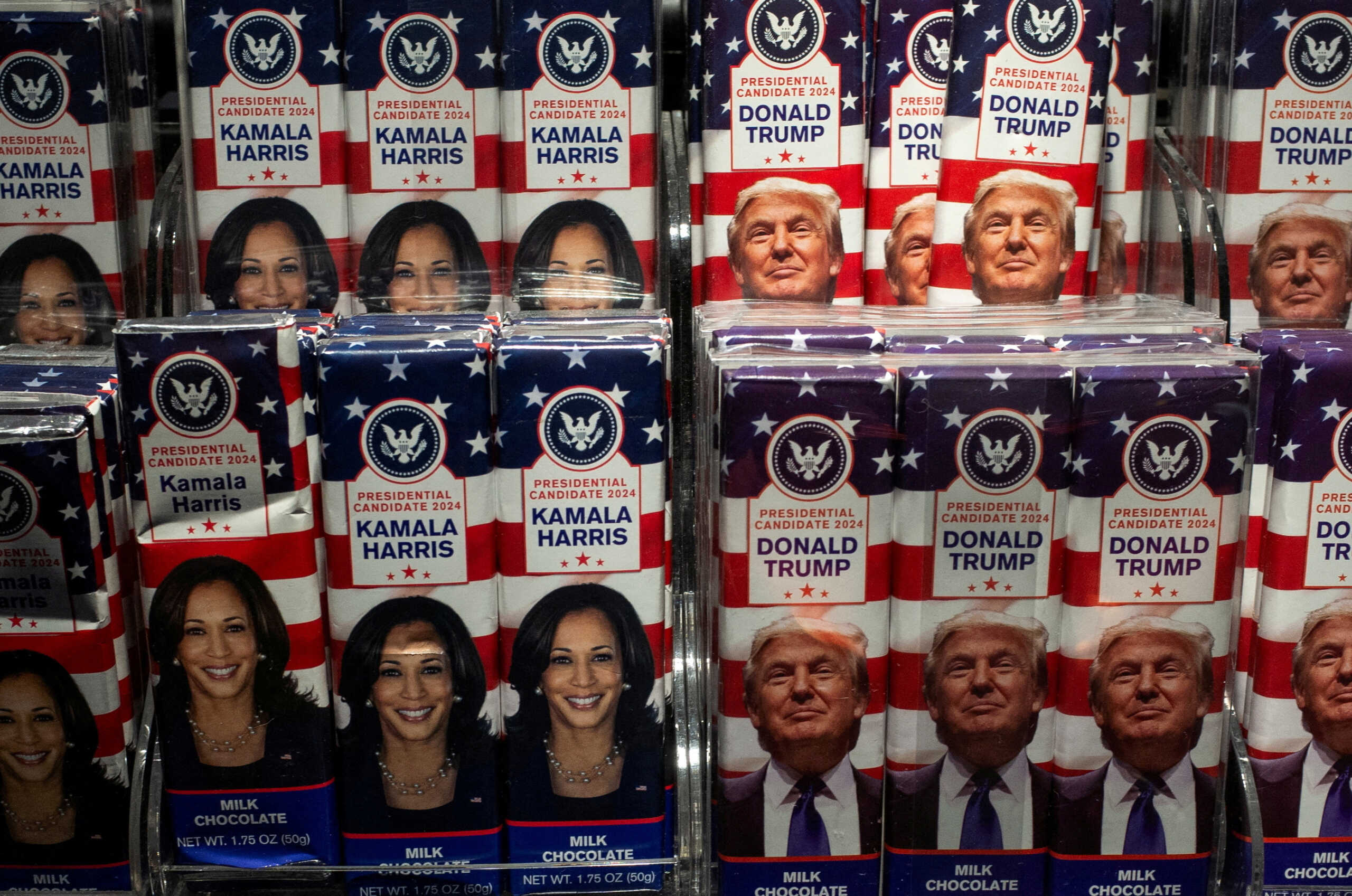 FILE PHOTO: Chocolate bars with the faces of Democratic presidential nominee U.S. Vice President Kamala Harris and Republican presidential nominee and former U.S. President Donald Trump are displayed at a store in John F. Kennedy International Airport, New York, U.S., October 25, 2024. REUTERS