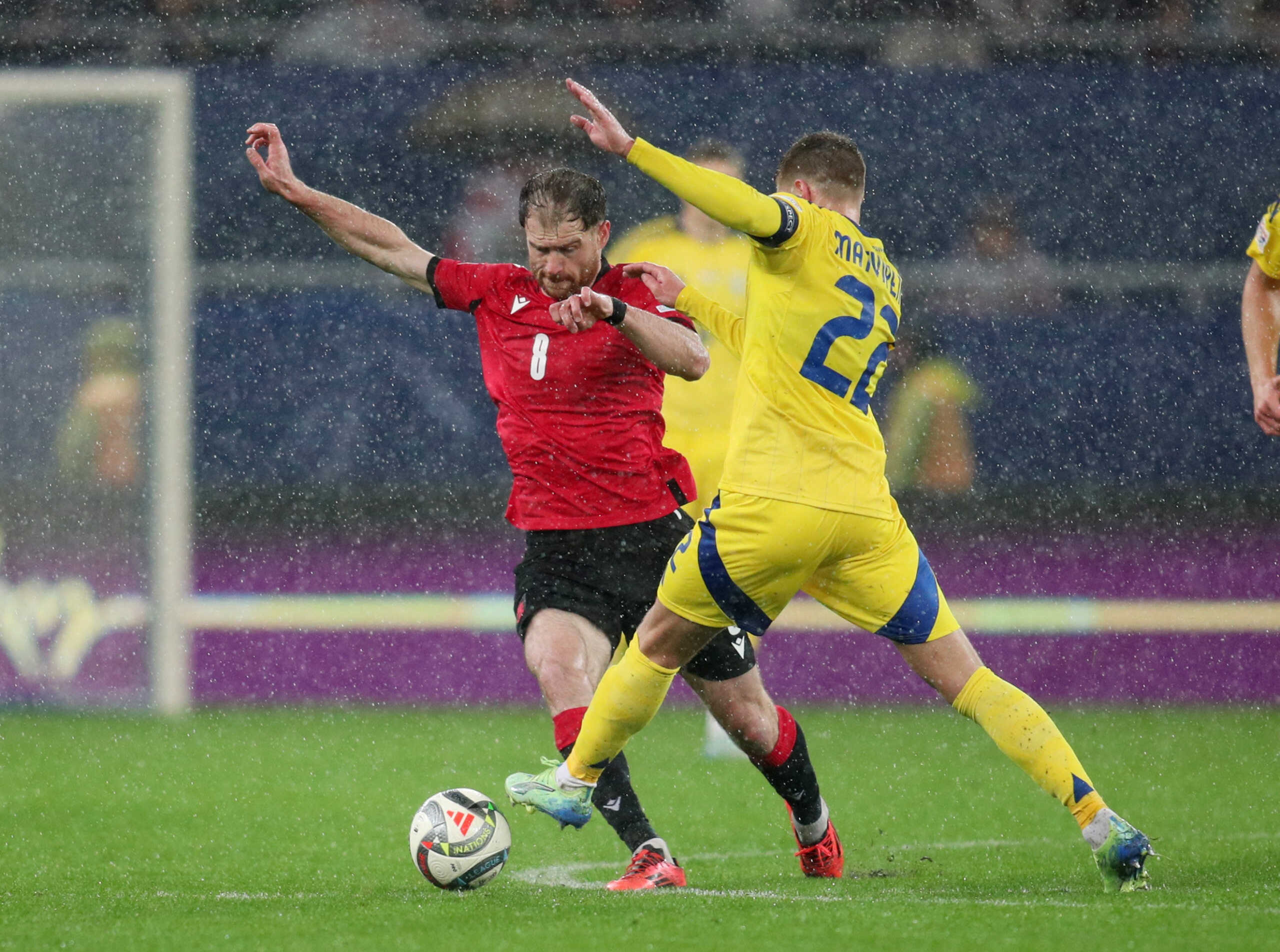 Soccer Football - Nations League - Group Stage - Georgia v Ukraine - Adjarabet Arena, Batumi, Georgia - November 16, 2024 Georgia's Budu Zivzivadze in action with Ukraine's Mykola Matviyenko REUTERS