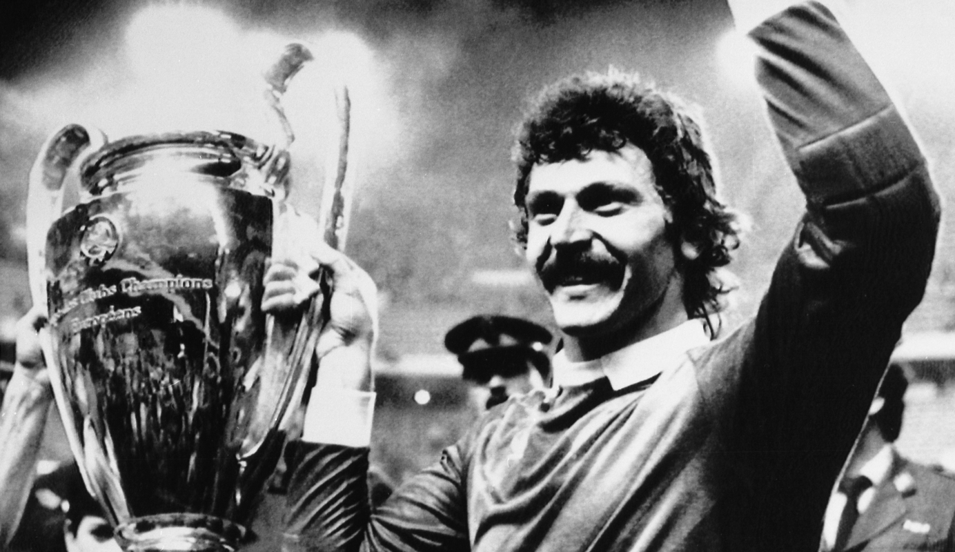 FILE - Steaua Bucharest goalkeeper Helmuth Duckadam raises the European Champions Cup after the Romainian team defeated Barcelona in penalties in Seville, Spain, May 7, 1986. When it comes to European soccer, nothing quite compares to Romanian club Steaua Bucharest going on a 119-match unbeaten run domestically from 1986-89. During that run, Steaua also won the European Cup in 1986 against FC Barcelona. (AP Photo