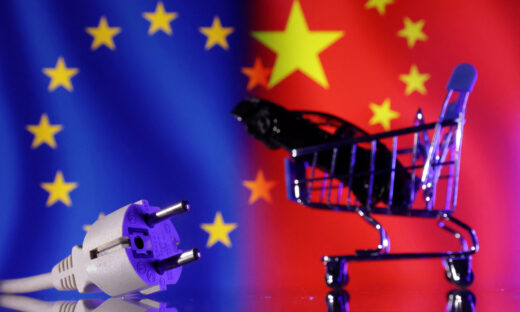 Power plug, shopping cart and miniature car are seen in front of EU and Chinese flags in this illustration taken December 17, 2024. REUTERS