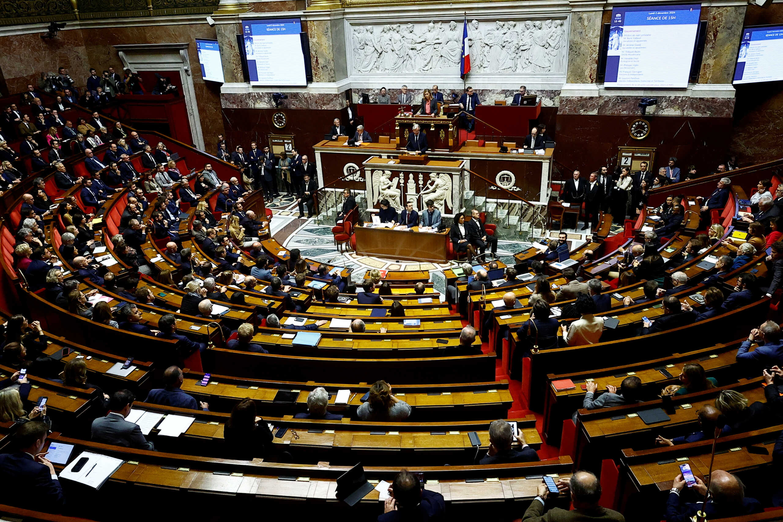 A general view shows the hemicycle as French Prime Minister Michel Barnier delivers a speech to announce the use by the French government of article 49.3, a special clause in the French Constitution, to push the budget bill through the National Assembly without a vote by lawmakers, during a debate on the 2025 Social Security Financing bill (PLFSS) at the National Assembly in Paris, France, December 2, 2024. REUTERS