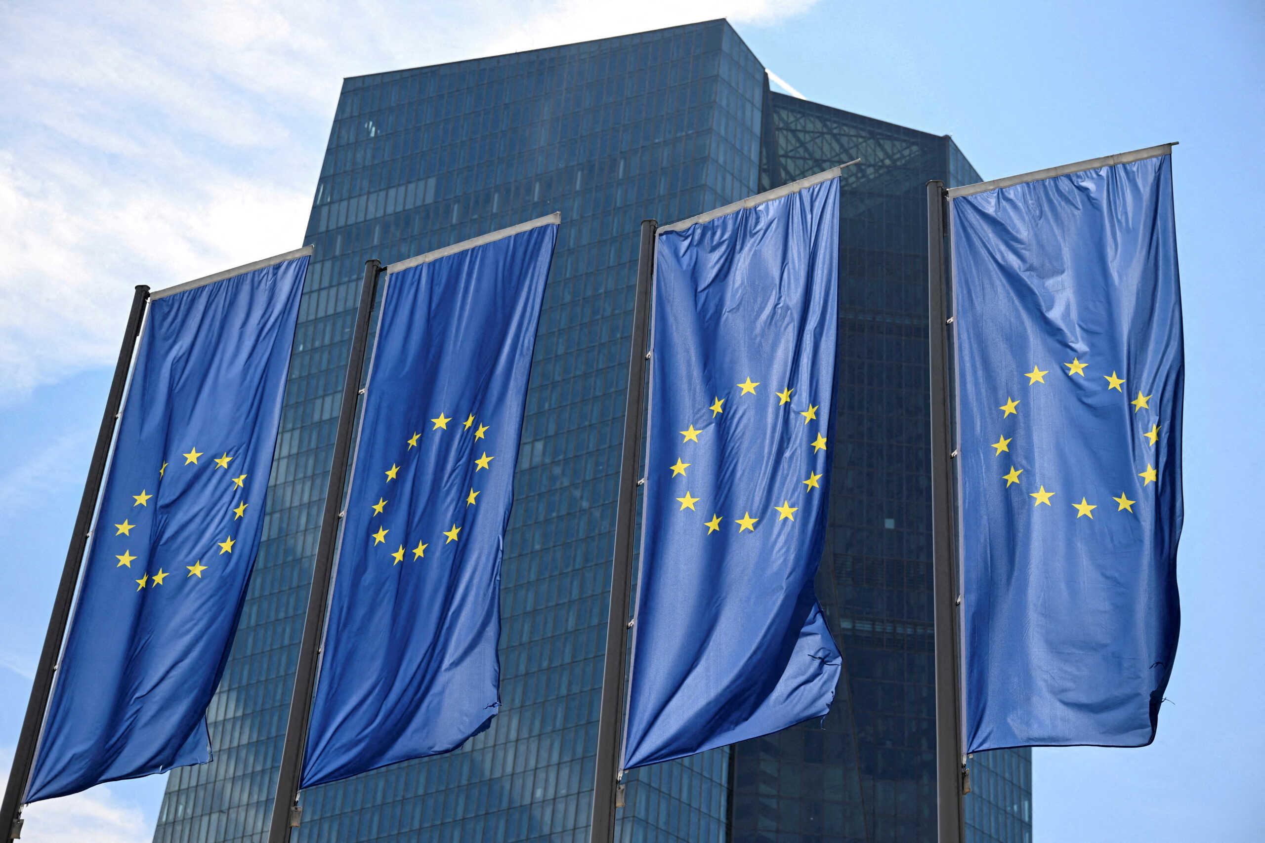 FILE PHOTO: EU flags flutter in front of European Central Bank (ECB) headquarters in Frankfurt, Germany July 18, 2024. REUTERS