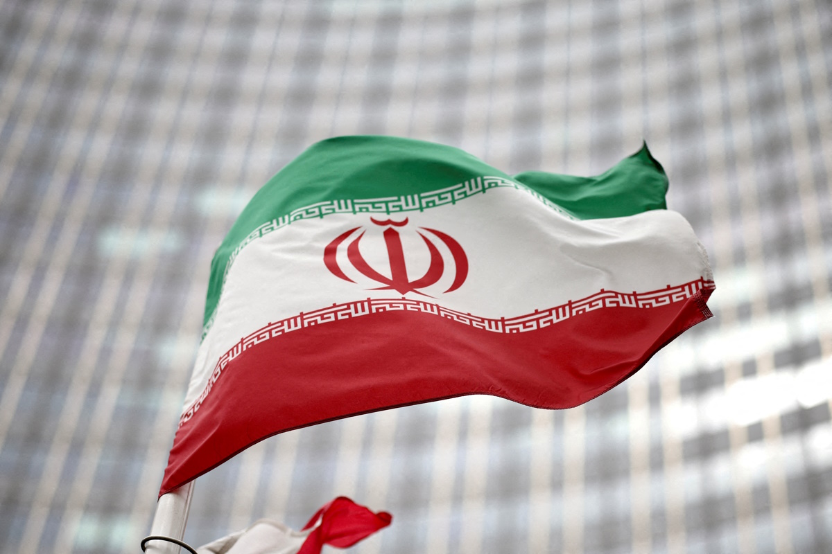 FILE PHOTO: Iranian flag flies in front of the UN office building, housing IAEA headquarters, amid the coronavirus disease (COVID-19) pandemic, in Vienna, Austria, May 24, 2021. REUTERS