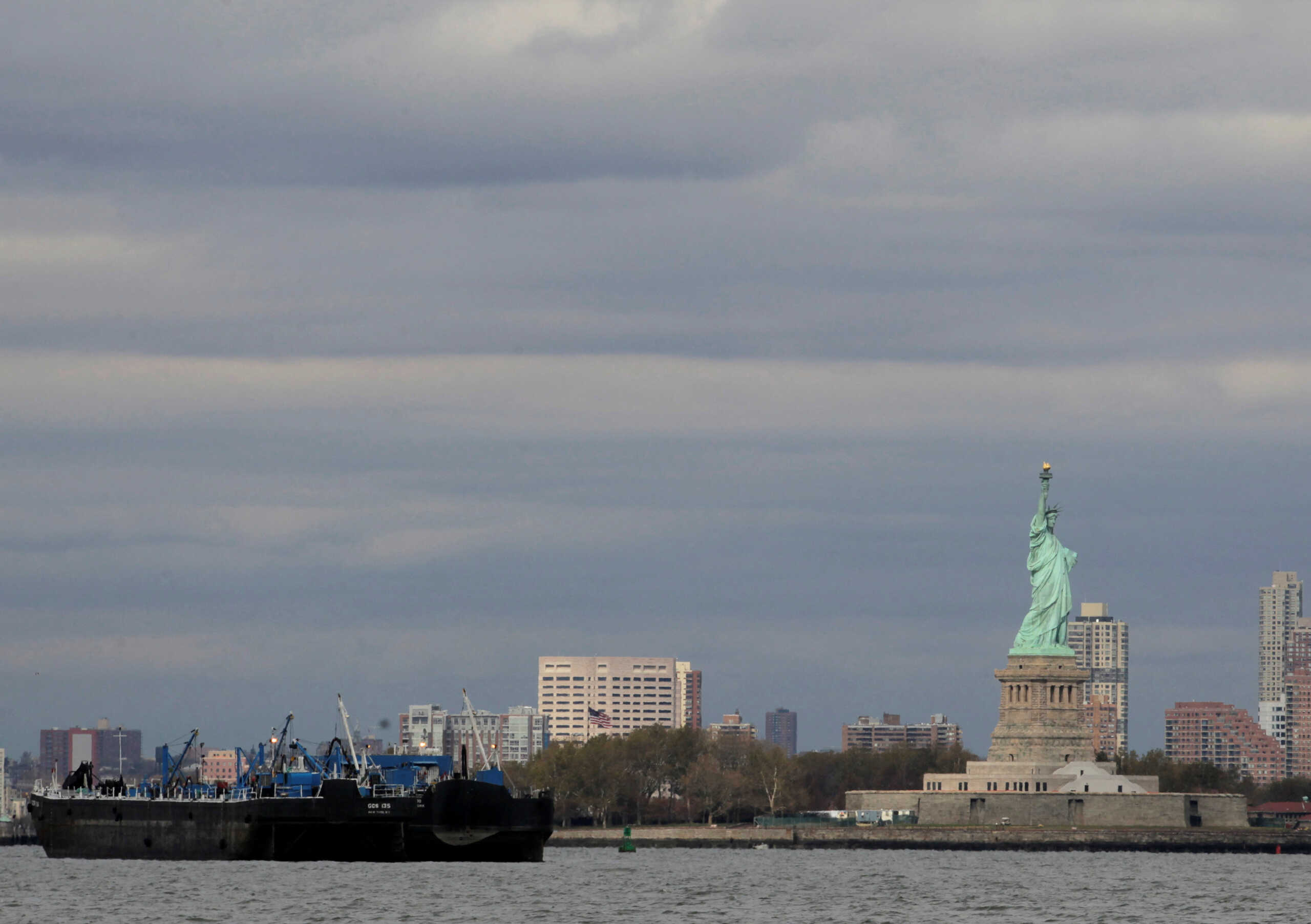 FILE PHOTO: An oil tanker is anchored in New York Harbor October 31, 2012.    REUTERS