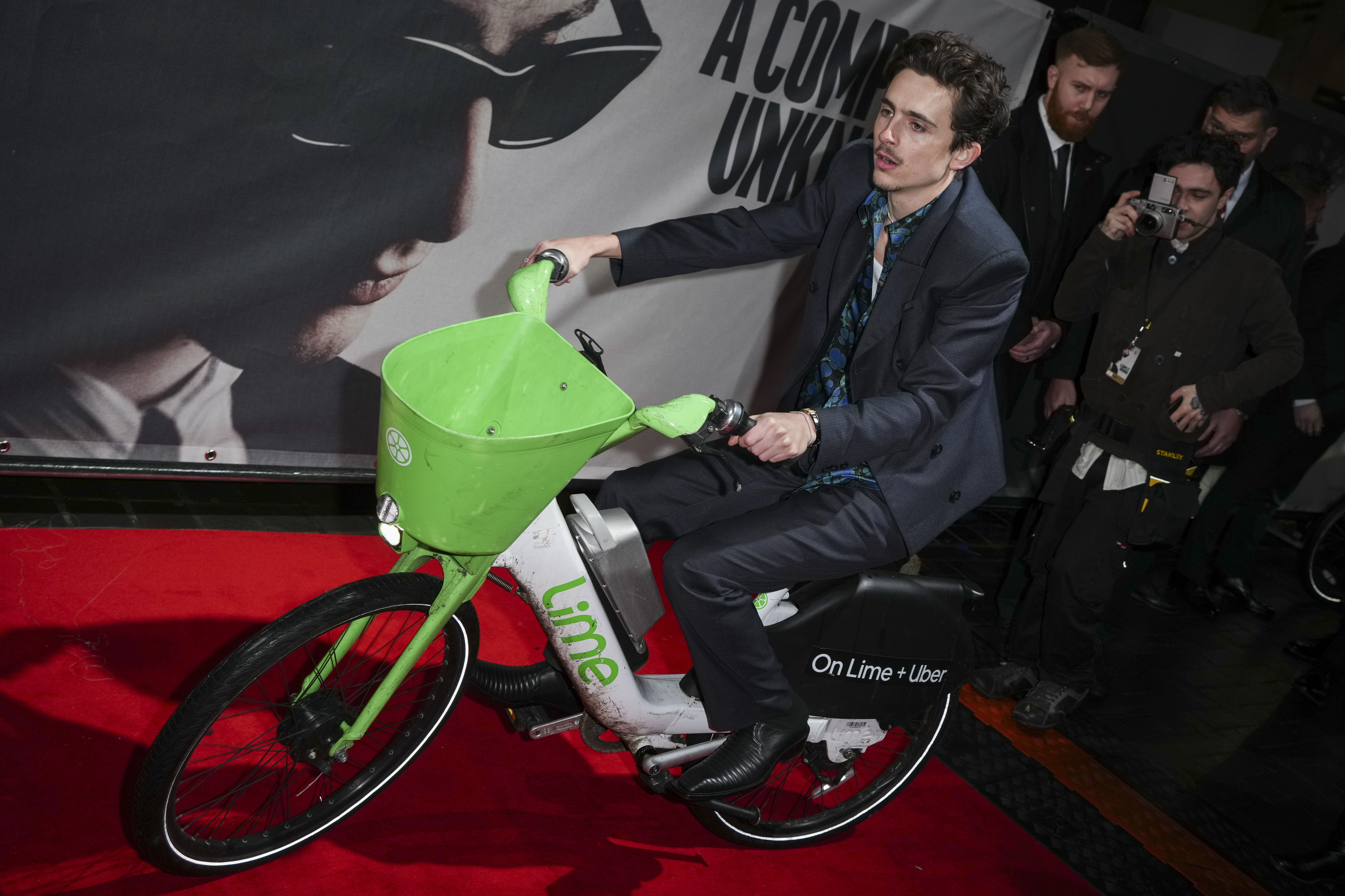 Timothee Chalamet poses for photographers upon arrival at the premiere of the film 'A Complete Unknown' in London, on Tuesday, Jan. 14, 2025. (Photo by Scott A Garfitt