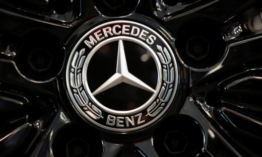 A logo of Mercedes-Benz