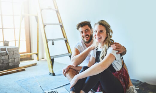 Shot of a young couple using a laptop