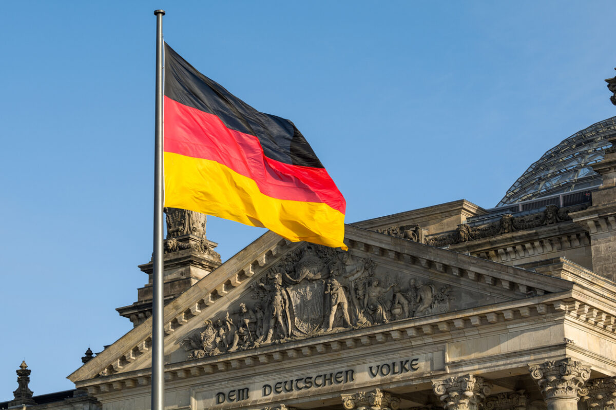 German flag fluttering front of Reichstag building