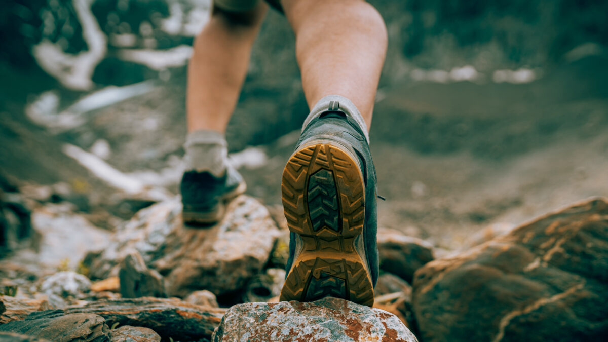 Mens foot steps in the mountains