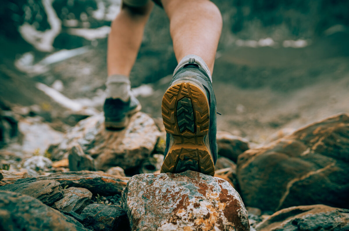 Mens foot steps in the mountains