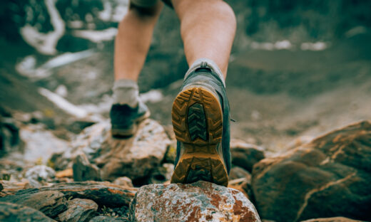 Mens foot steps in the mountains