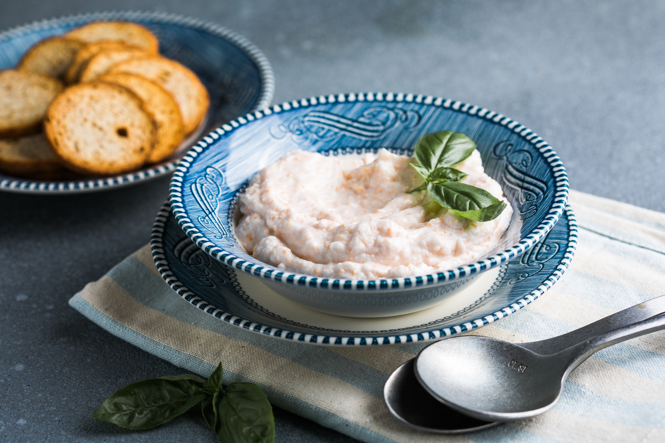 Taramosalata Greek spread Paste (pate) made of ground fish, shrimps, and caviar, served with lemon. Fish Egg Paste Tarama (white and rose), popular Israeli snack.