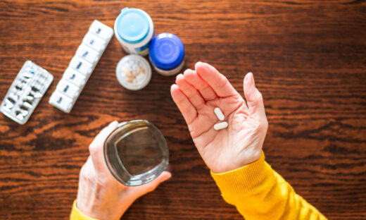 Senior woman taking a medical pill