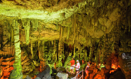 Crete, Greece - July 20, 2014: Cave of Zeus (Psychro Cave) in the Lasithi district on Crete island, tourists discover the cave.