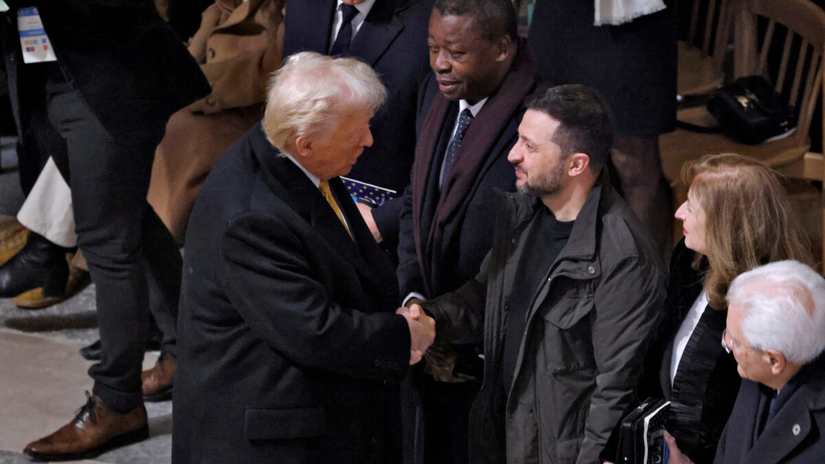 FILE PHOTO: U.S. President-elect Donald Trump and Ukrainian President Volodymyr Zelenskiy shake hands inside the Notre-Dame de Paris Cathedral ahead of a ceremony to mark its re-opening following the 2019 fire, in Paris, France, December 7, 2024. LUDOVIC MARIN/Pool via REUTERS/File Photo