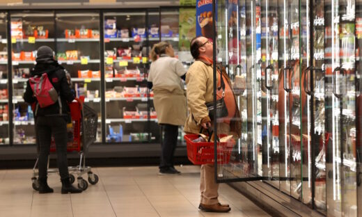 Customers shop at a supermarket in Budapest