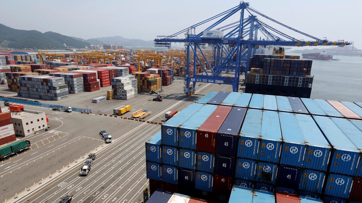 Trucks used to transport containers are seen at the Hanjin Shipping container terminal at the Busan New Port in Busan