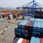 Trucks used to transport containers are seen at the Hanjin Shipping container terminal at the Busan New Port in Busan