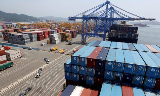 Trucks used to transport containers are seen at the Hanjin Shipping container terminal at the Busan New Port in Busan