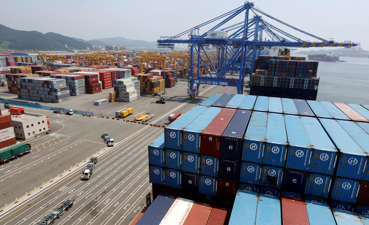 Trucks used to transport containers are seen at the Hanjin Shipping container terminal at the Busan New Port in Busan