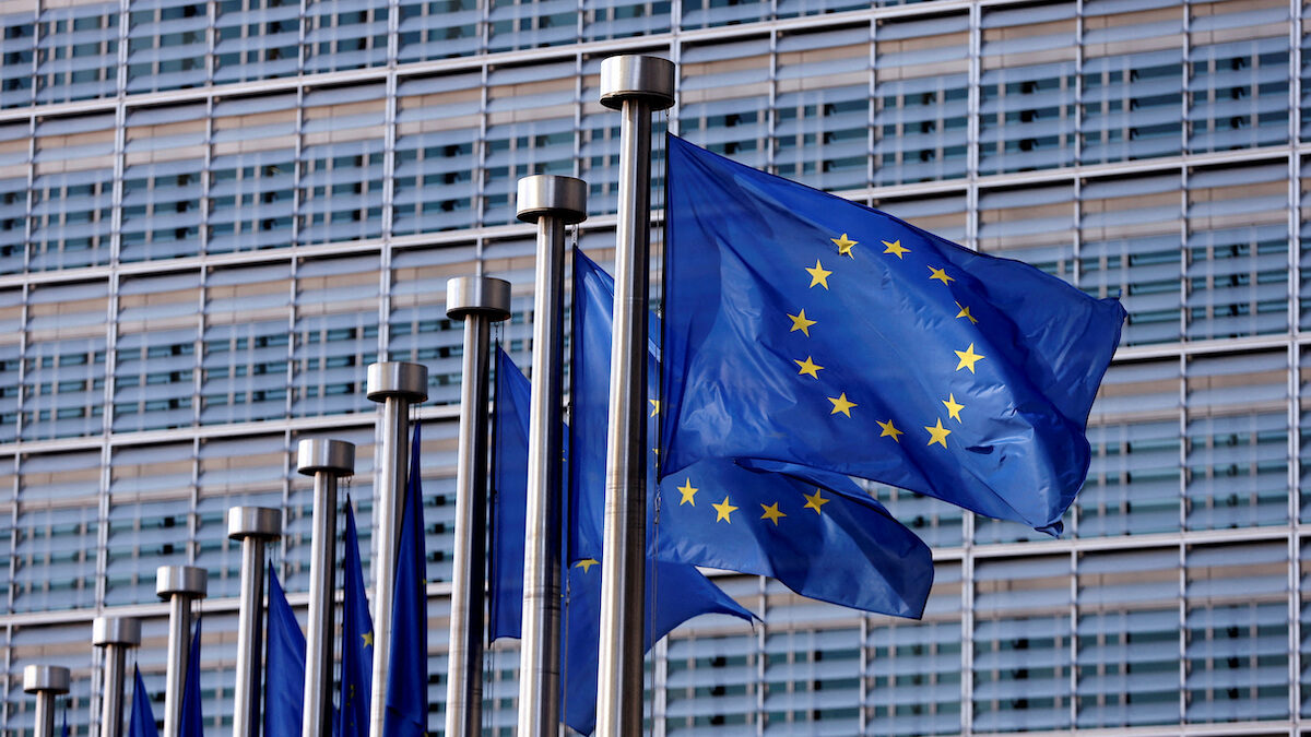 EU flags flutter outside the EU Commission headquarters