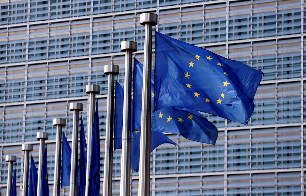 EU flags flutter outside the EU Commission headquarters