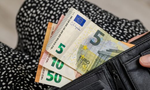 a wallet with euro money