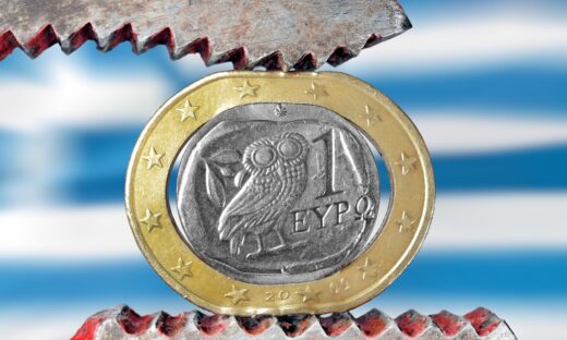 Greek euro stressed with a plier symbolizing the financial problems of the country