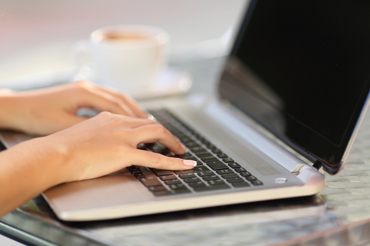 a woman working on a laptop