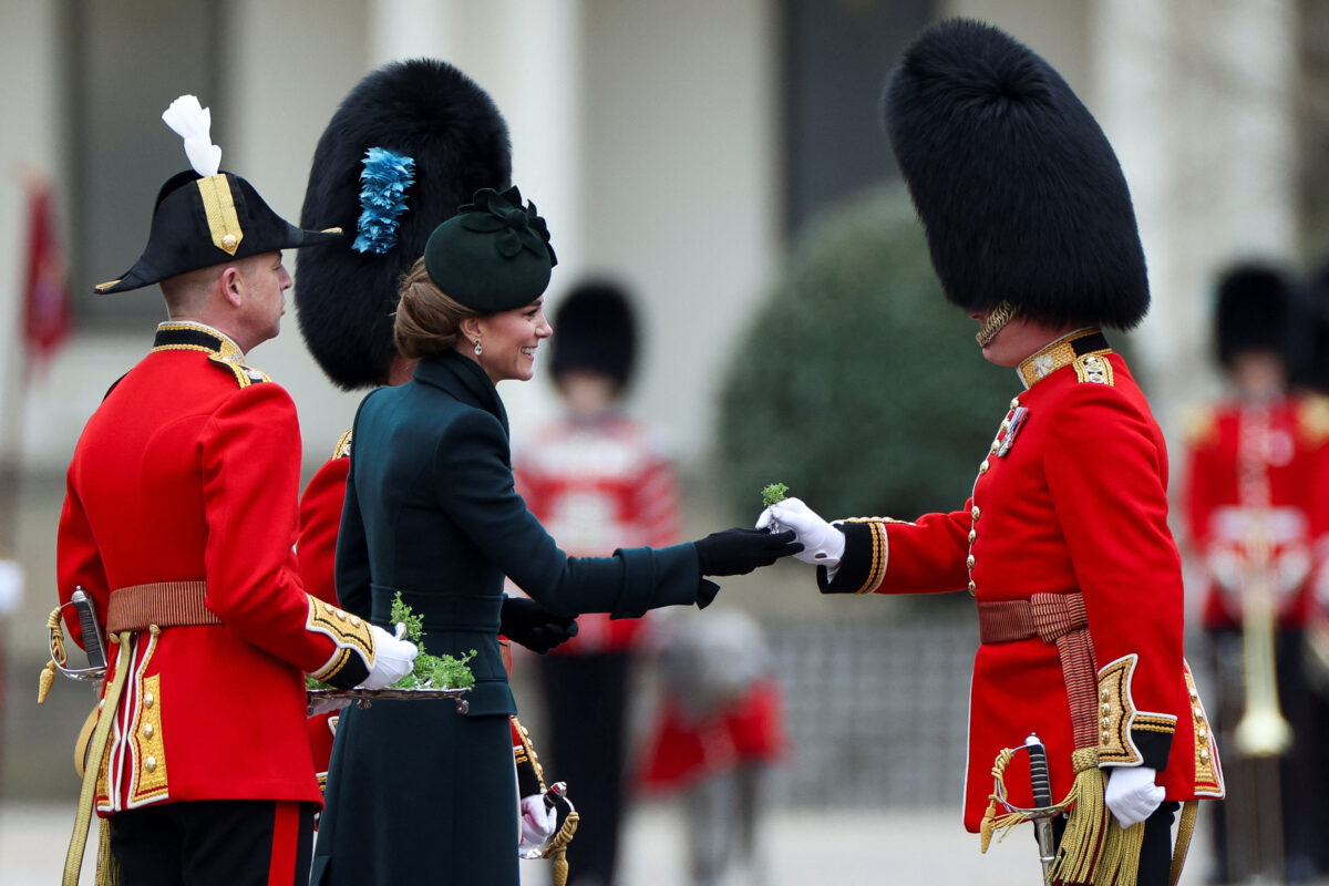 Britain's Catherine, Princess of Wales, presents a traditional sprig of shamrock to a guardsman during the St. Patrick's Day Parade at Wellington Barracks in London, Britain, March 17, 2025. REUTERS